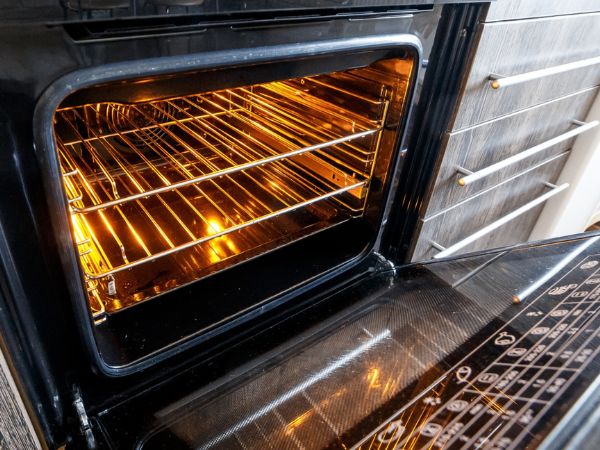 What happens if you open an oven during self-clean